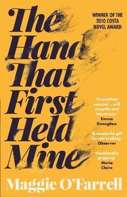 Cover: The Hand That First Held Mine